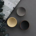 Pomo plano redondo para muebles y cajones – gris perla, dorado o negro – zamak – pack de 2