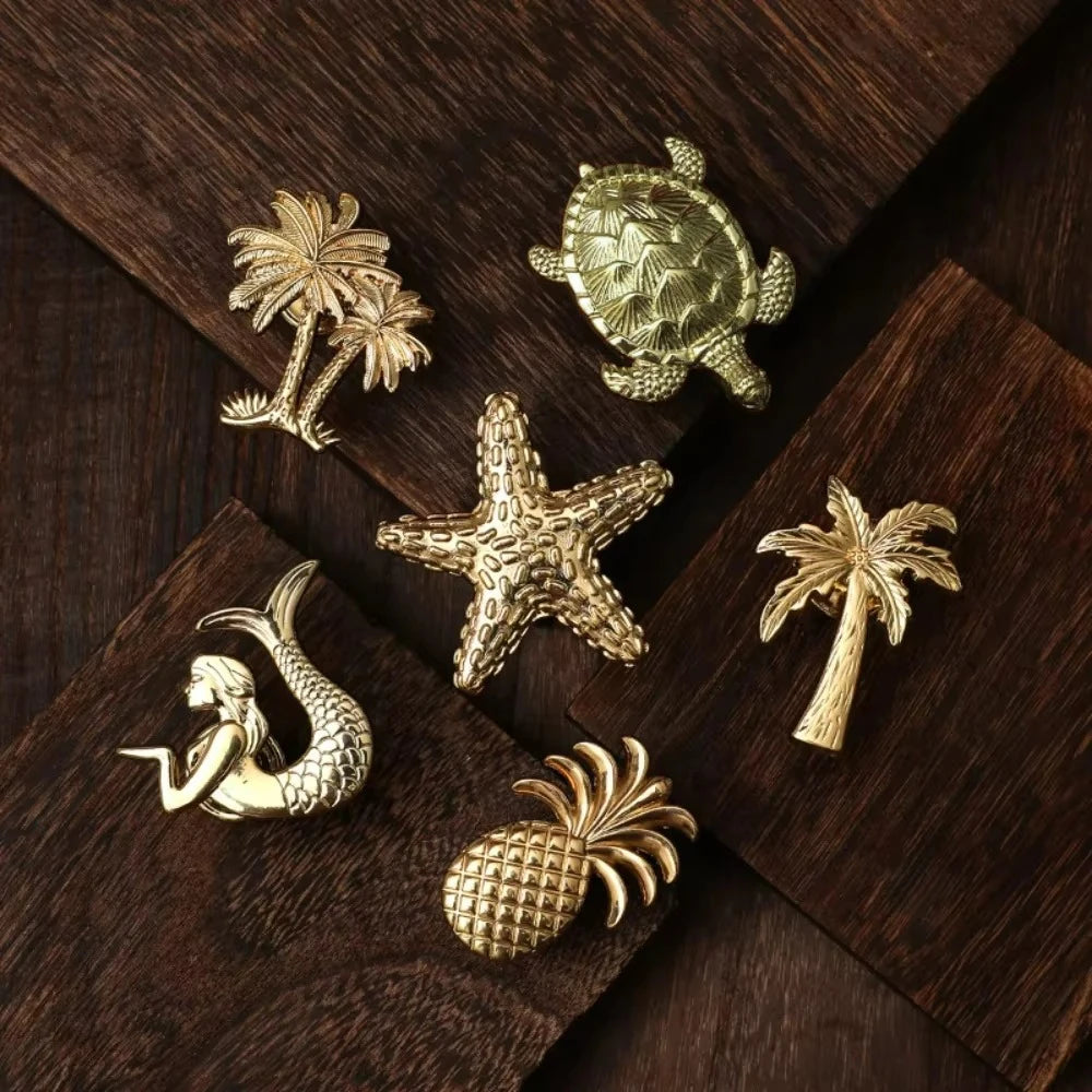 Pomo dorado decorativo con forma de animal o planta – para cajones y armarios – 25 diseños – zamak