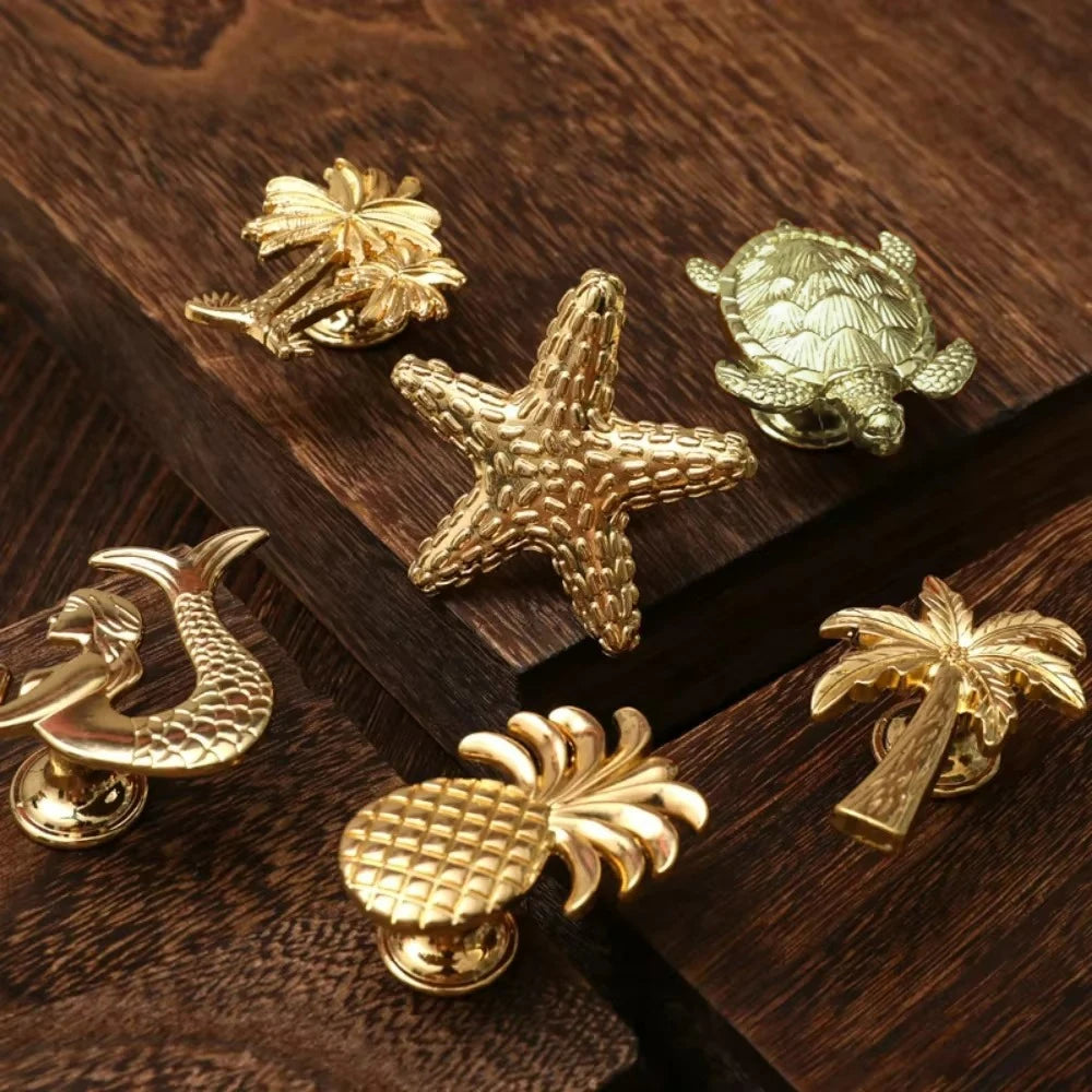 Pomo dorado decorativo con forma de animal o planta – para cajones y armarios – 25 diseños – zamak