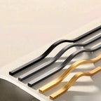 Tirador largo ondulado para armarios y cocina – negro, dorado o gris – aluminio – 160 a 384 mm