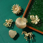 Pomo dorado decorativo con forma de animal o planta – para cajones y armarios – 25 diseños – zamak