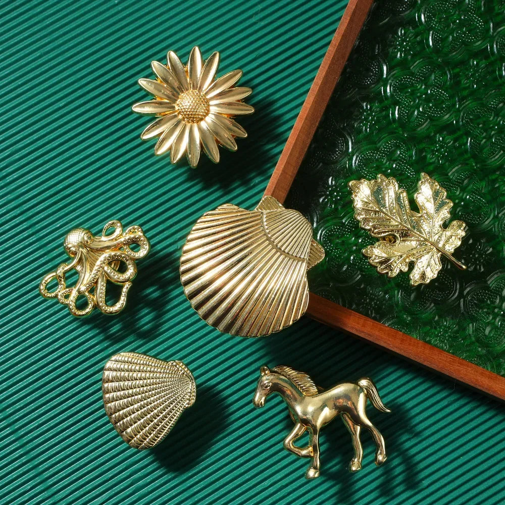 Pomo dorado decorativo con forma de animal o planta – para cajones y armarios – 25 diseños – zamak