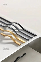 Tirador largo ondulado para armarios y cocina – negro, dorado o gris – aluminio – 160 a 384 mm